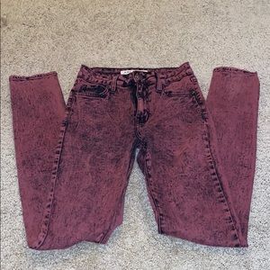 Maroon and black washed jeans.